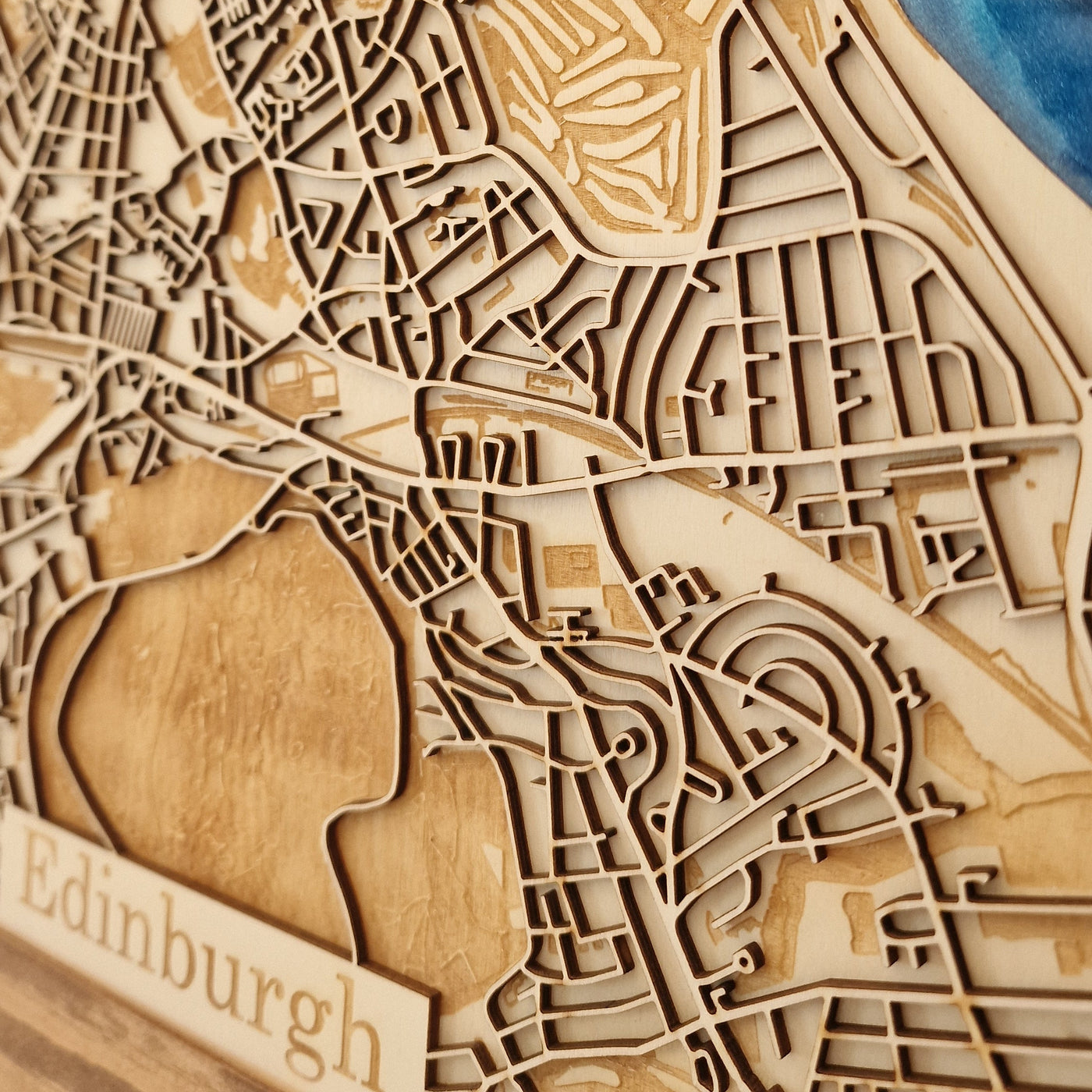 Wooden map of Edinburgh with detailed street patterns